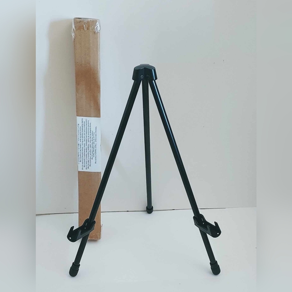 Amazon Basics Instant Adjustable Collapsible Tabletop Tripod Easel.